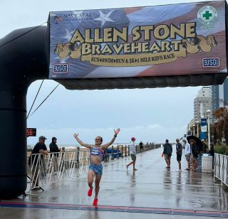 Alexey Wins Braveheart 5 km
Alexey Popov overcame a combined race start, a box cargo pedal trike on the course, street vendors & a food festival opening for the day, no lead vehicle for the last mile, rain showers which made footing slick and a head wind on the boardwalk to the finish to win the Allen Stone Braveheart 5 km in Virginia Beach with a time of 19:53.